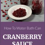 Pinterest Pin for How To Water Bath Can Cranberry Sauce. Picture of cranberry sauce in a bowl with two mason jars of water bath canned cranberry sauce.