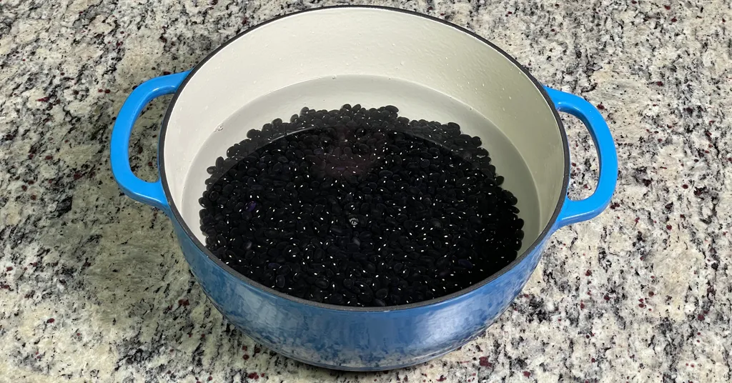 Dry Black Beans being rehydrated before Pressure Canning.