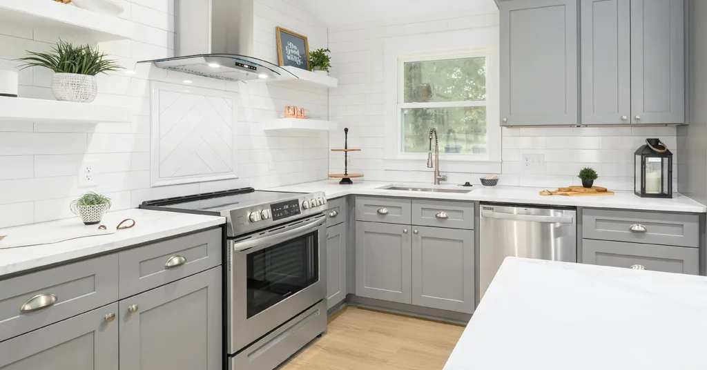 Glass Topped Stove in a grey and white kitchen.