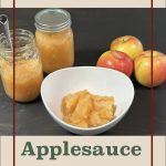 Pinterest Pin for Water Bath Canning Applesauce. Image of mason jars of applesauce and a bowl of applesauce and two apples sitting on a counter.