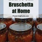 Pinterest Pin for How To Can Bruschetta at Home. Image of mason jars of bruschetta after being water bath canned.