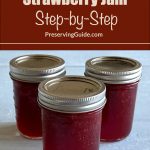 Pinterest Pin for How To Can Strawberry Jam Step-by-Step. Image of three mason jars of Strawberry Jam that have been steam canned.