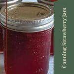 Pinterest Pin for Canning Strawberry Jam Tips and Tricks. Image of three mason jars of Strawberry Jam that have been steam canned.