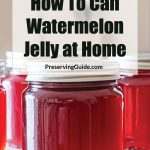 Pinterest Pin for How To Can Watermelon Jelly at Home. Image of mason jars of watermelon jelly sitting on a counter.