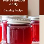 Pinterest Pin for Watermelon Jelly Canning Recipe. Image of mason jars of watermelon jelly sitting on a counter.