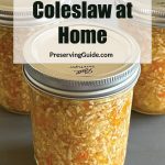 Image of three jars filled with homemade coleslaw, each sealed with a lid. Overlaid text reads "How To Can Coleslaw at Home" with "PreservingGuide.com" below.