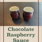 Pinterest Pin for Water Bath Canning Chocolate Raspberry Sauce. Image of two mason jars of chocolate raspberry sauce sitting on a dark surface.