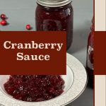 Image of a sealed jar of cranberry sauce next to a plate of cranberry sauce, with scattered cranberries in the background. The text "Cranberry Sauce" is prominently displayed on a brown background, with the website "PreservingGuide.com" at the bottom, highlighting the cranberry sauce and its source for preservation guidance.