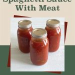 The image shows three jars of spaghetti sauce with meat, sealed with metal lids, arranged on a white surface. The jars are centered against a beige and green background. At the top of the image, in brown and green text, it reads: "How To Pressure Can Spaghetti Sauce With Meat." At the bottom of the image, there is a small mason jar icon. This image is designed to accompany a guide or tutorial on pressure canning spaghetti sauce with meat.