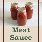 The image shows three jars filled with pressure-canned meat sauce, sealed with metal lids, arranged on a white surface. The image is bordered with a beige background. At the top, the text reads "Pressure Canning" in a brown font, and below the jars, "Meat Sauce" is written in large green letters. At the bottom center, there is a small mason jar icon. This design focuses on the process of pressure canning meat sauce.