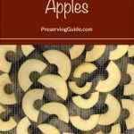 The image features slices of apples laid out on a dehydrator tray, prepared for dehydration. The top of the image contains a bold red banner with the text "How To Dehydrate Apples" and a website link "PreservingGuide.com."