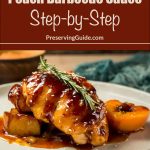 This image showcases a plate of roasted chicken generously coated in a peach barbecue sauce, garnished with a fresh sprig of rosemary, alongside a halved grilled peach. The top portion of the image has text over a brown banner that reads, “How To Can Peach Barbecue Sauce Step-by-Step” followed by “PreservingGuide.com,” promoting a step-by-step guide for canning homemade peach BBQ sauce.