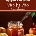 This image is a Pinterest pin for an Apple Pie Jam recipe. It shows a jar of amber-colored jam with a spoon inside, accompanied by a piece of toast generously spread with the jam. The background includes whole apples, enhancing the homemade vibe. The text at the top reads, "Making Apple Pie Jam Step-by-Step" with the website PreservingGuide.com written below, offering a detailed guide for the recipe. The warm colors and rustic presentation invite viewers to explore the canning process.