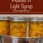 This image shows a close-up of three mason jars filled with sliced peaches in light syrup, placed in a metal steam canning pot. The text overlay reads, "How To Can Peaches in Light Syrup," with "PreservingGuide.com" listed below. Ideal for illustrating the home canning process.