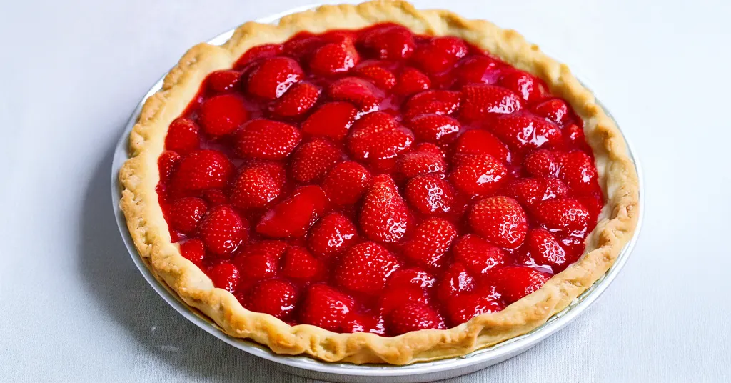 Strawberry Pie Filling that has been baked in a pie shell for a delicious Strawberry Pie